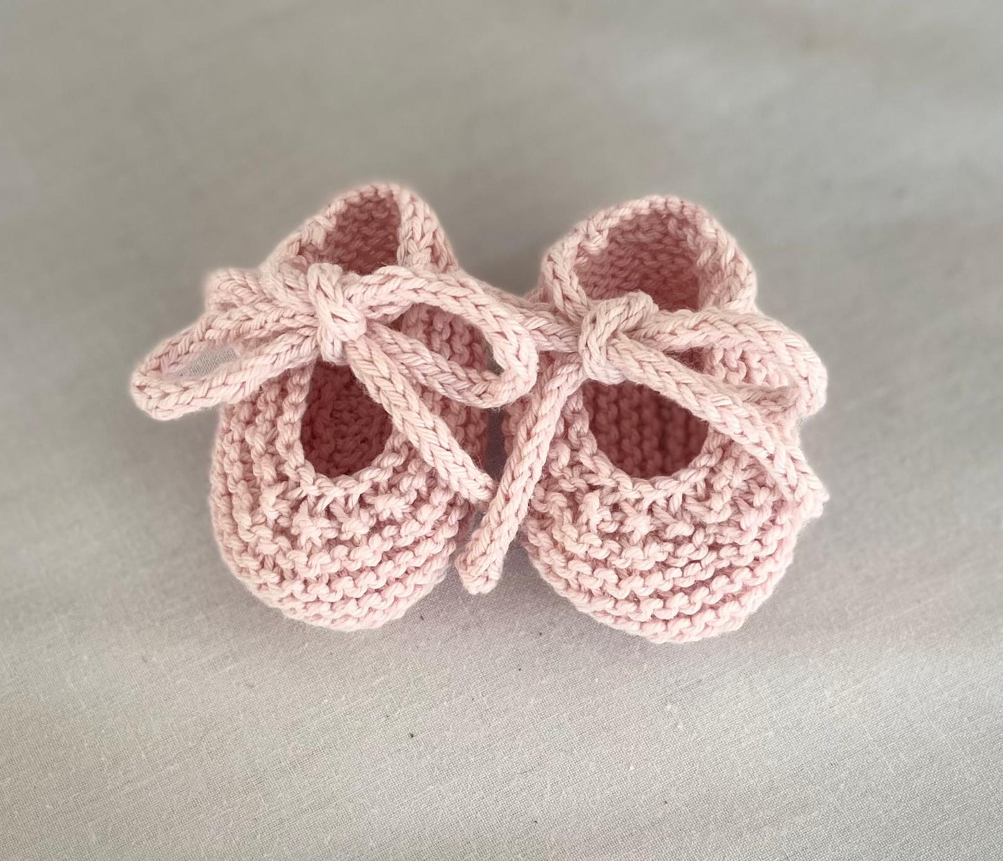 Booties with bow closure